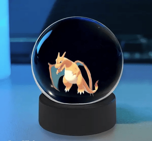 Cute Sphere Vision 3D hologram display ball with animated LED visual effects on a desktop